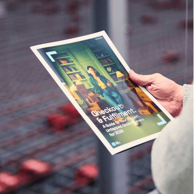 woman holding whitepaper in warehouse