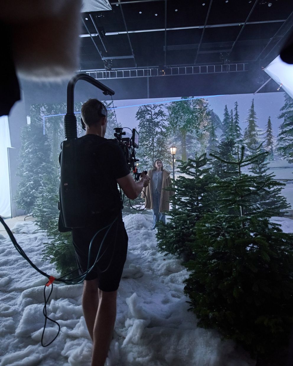 Image of a person in a virtual production studio.