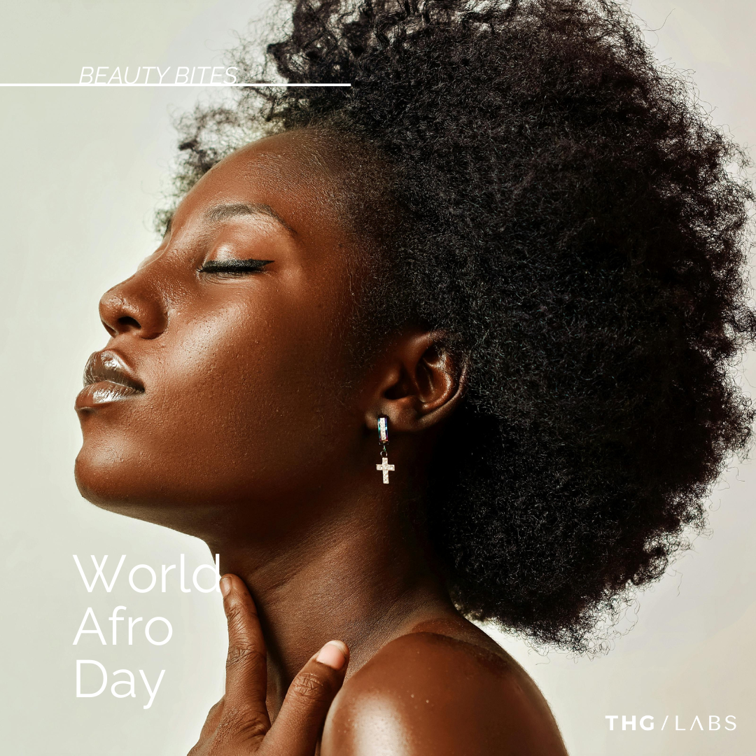 Woman with natural Afro-textured hair in profile.