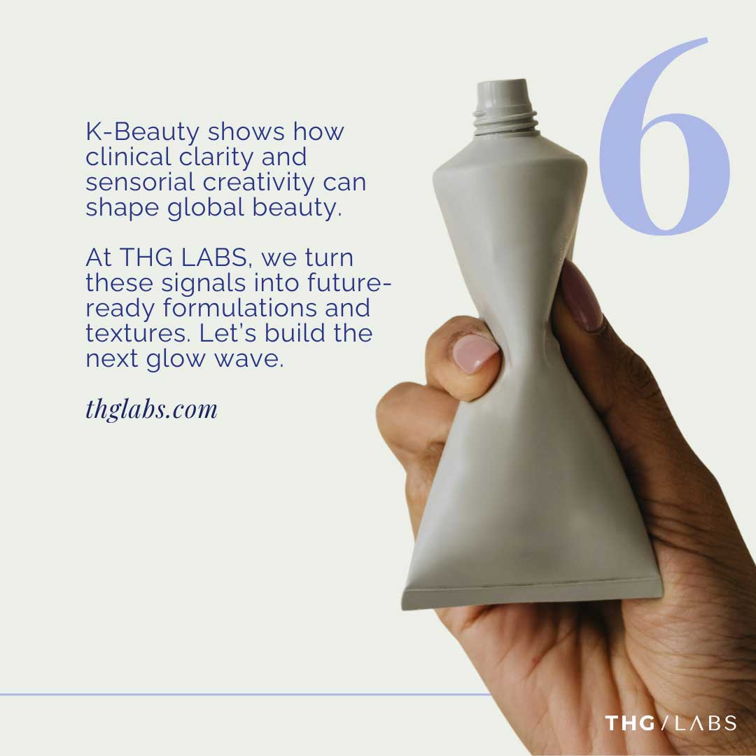 Hand holding skincare packaging symbolising the blend of clinical thinking and ritual use