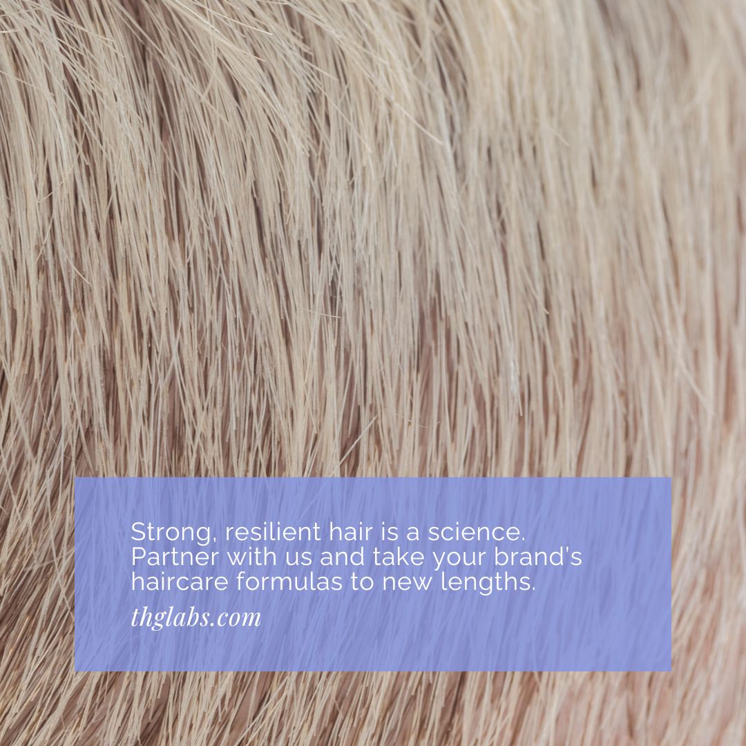 Close-up of healthy hair texture with brand messaging, reinforcing science-led haircare formulation and manufacturing expertise from THG LABS.