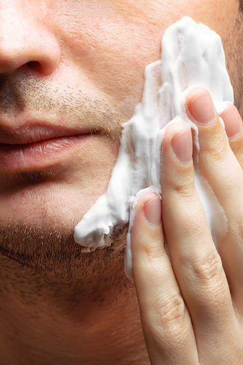Close-up of skincare cream applied to facial skin representing inclusive, science-led dermocosmetic formulation development at THG LABS.