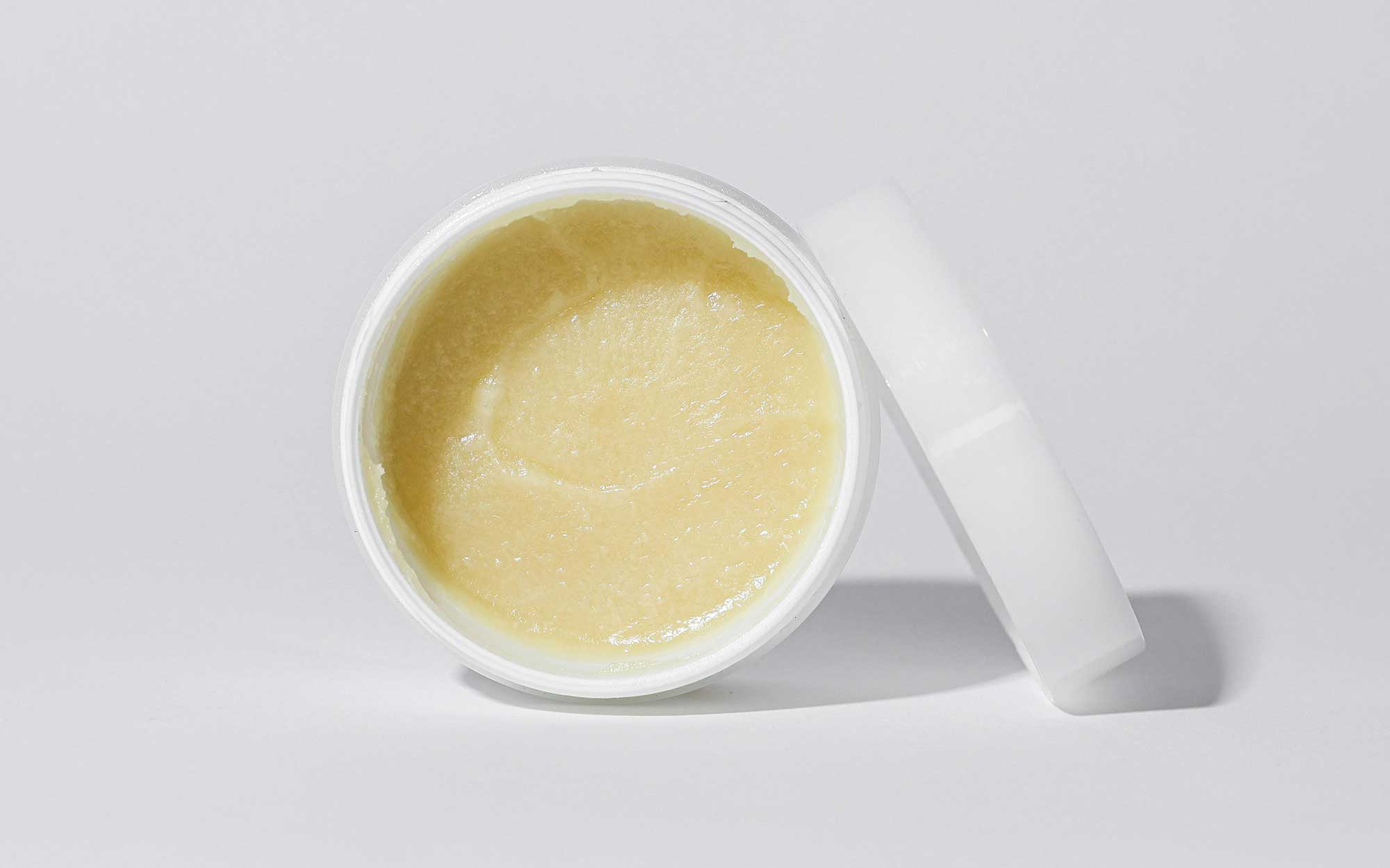Finished cosmetic balm product representing the final stage of beauty product development from concept through to commercial manufacturing at THG LABS.