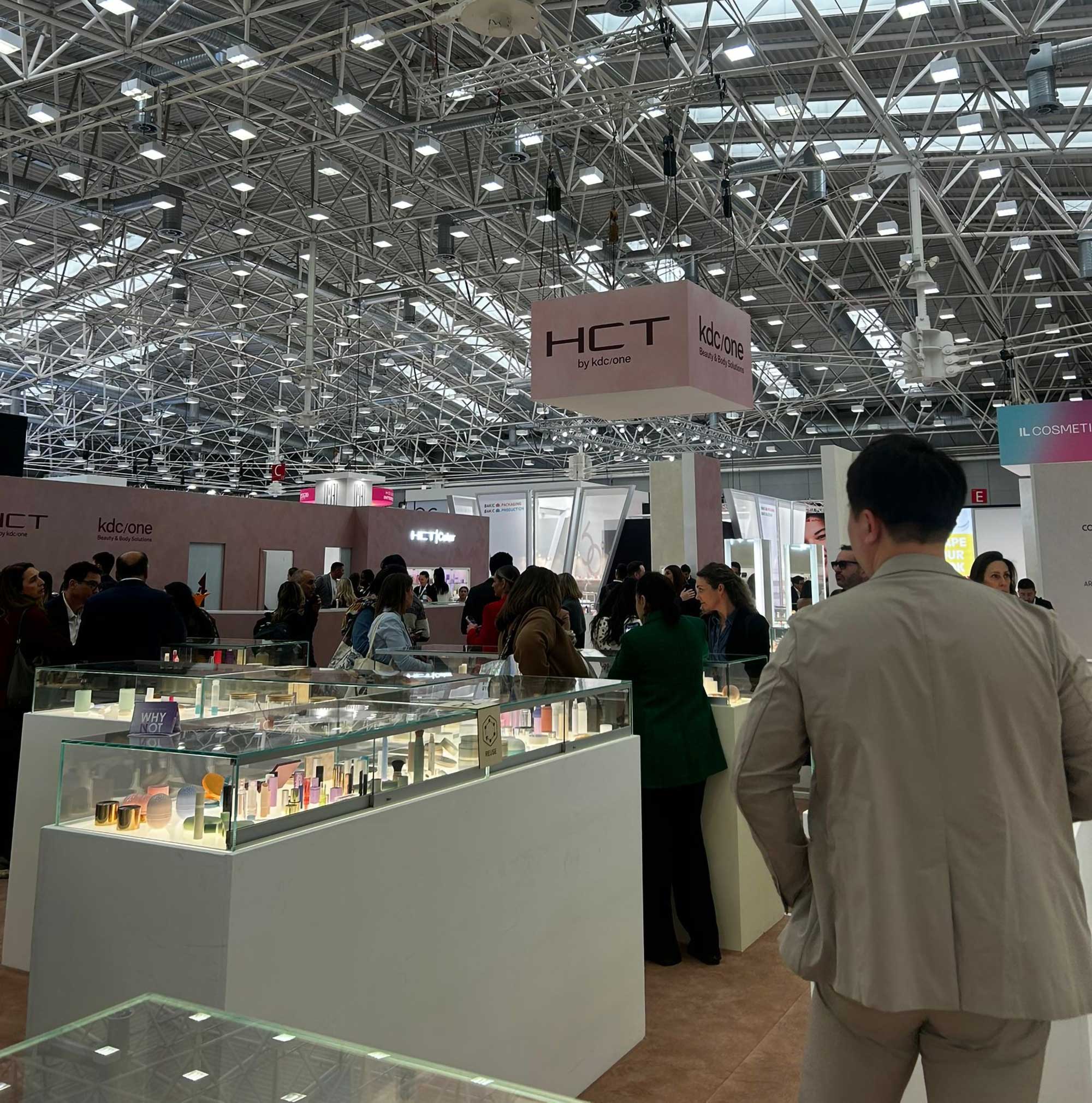Beauty industry professionals exploring innovation at In-Cosmetics Global exhibition highlighting ingredient sourcing and cosmetic manufacturing partnerships