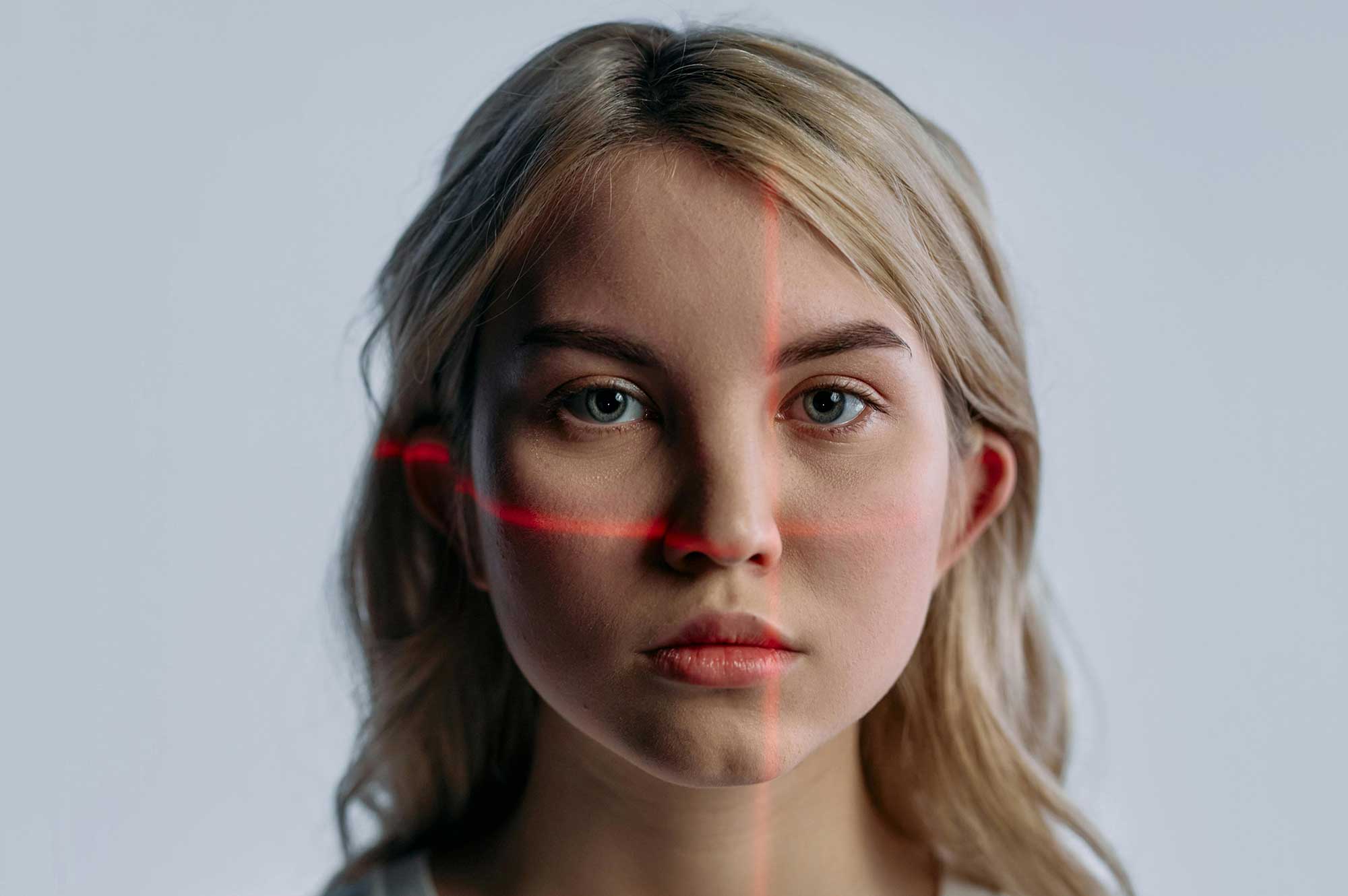 Precision skin analysis with laser scan demonstrating advanced formulation science in dermocosmetics manufacturing