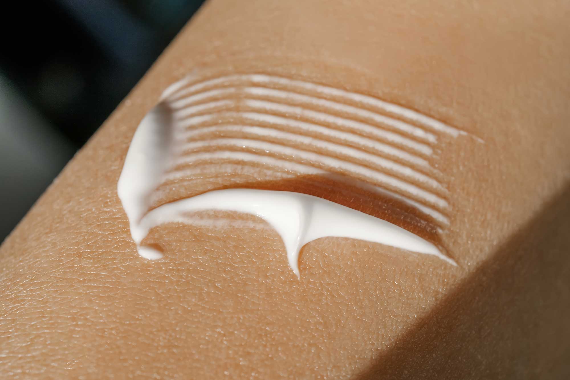 Cosmetic scientists at THG LABS developing advanced SPF formulations and UV protection products in the laboratory.