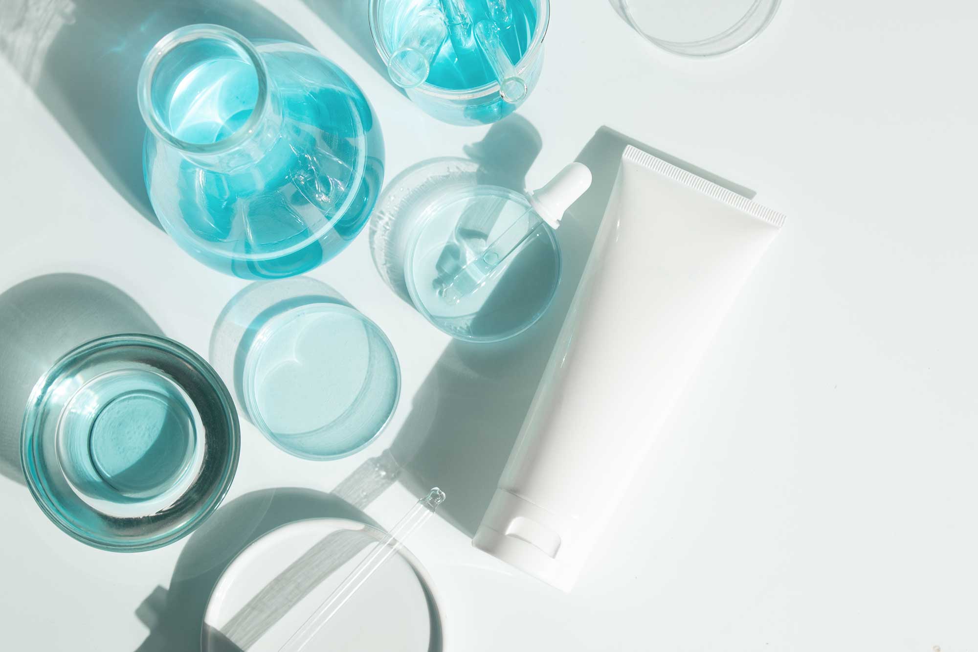 Sunscreen tube and cosmetic packaging components illustrating packaging selection and compatibility considerations in suncare product development.
