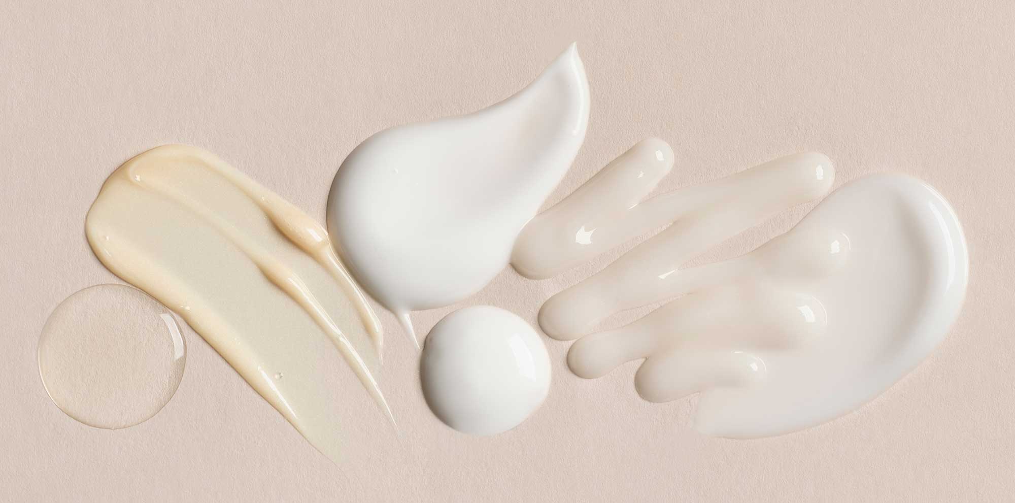 Different cosmetic cream, gel and lotion textures illustrating sensorial formulation and texture development for body care products.