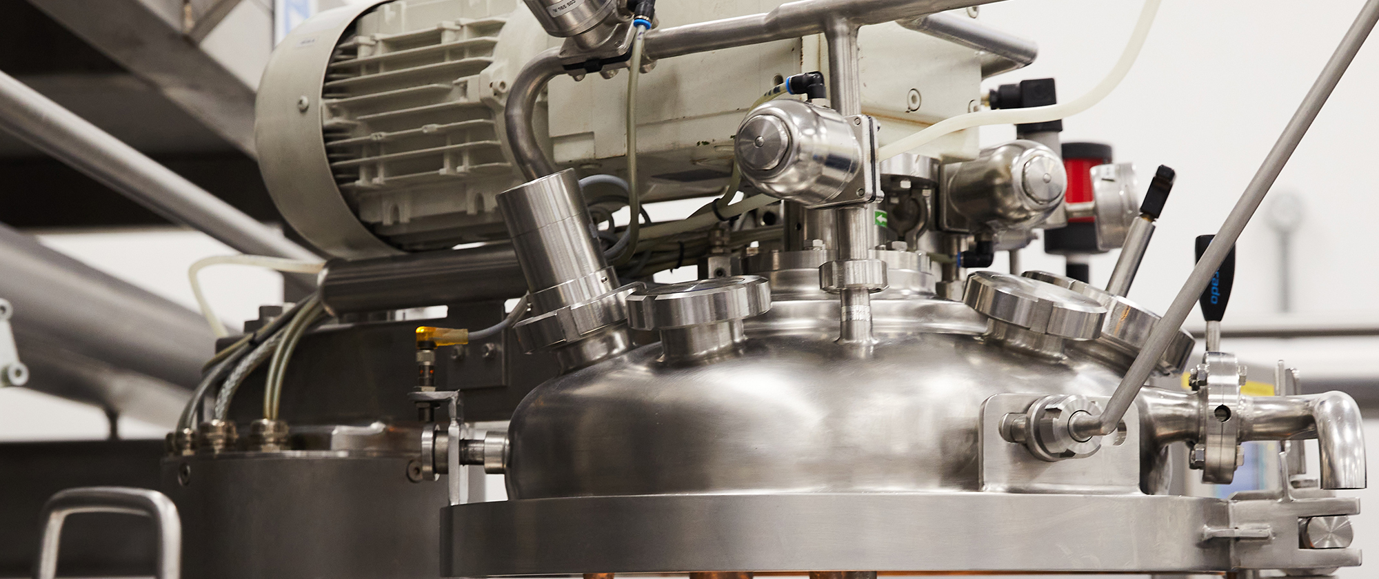 Stainless steel cosmetic mixing vessel in THG LABS UK manufacturing facility