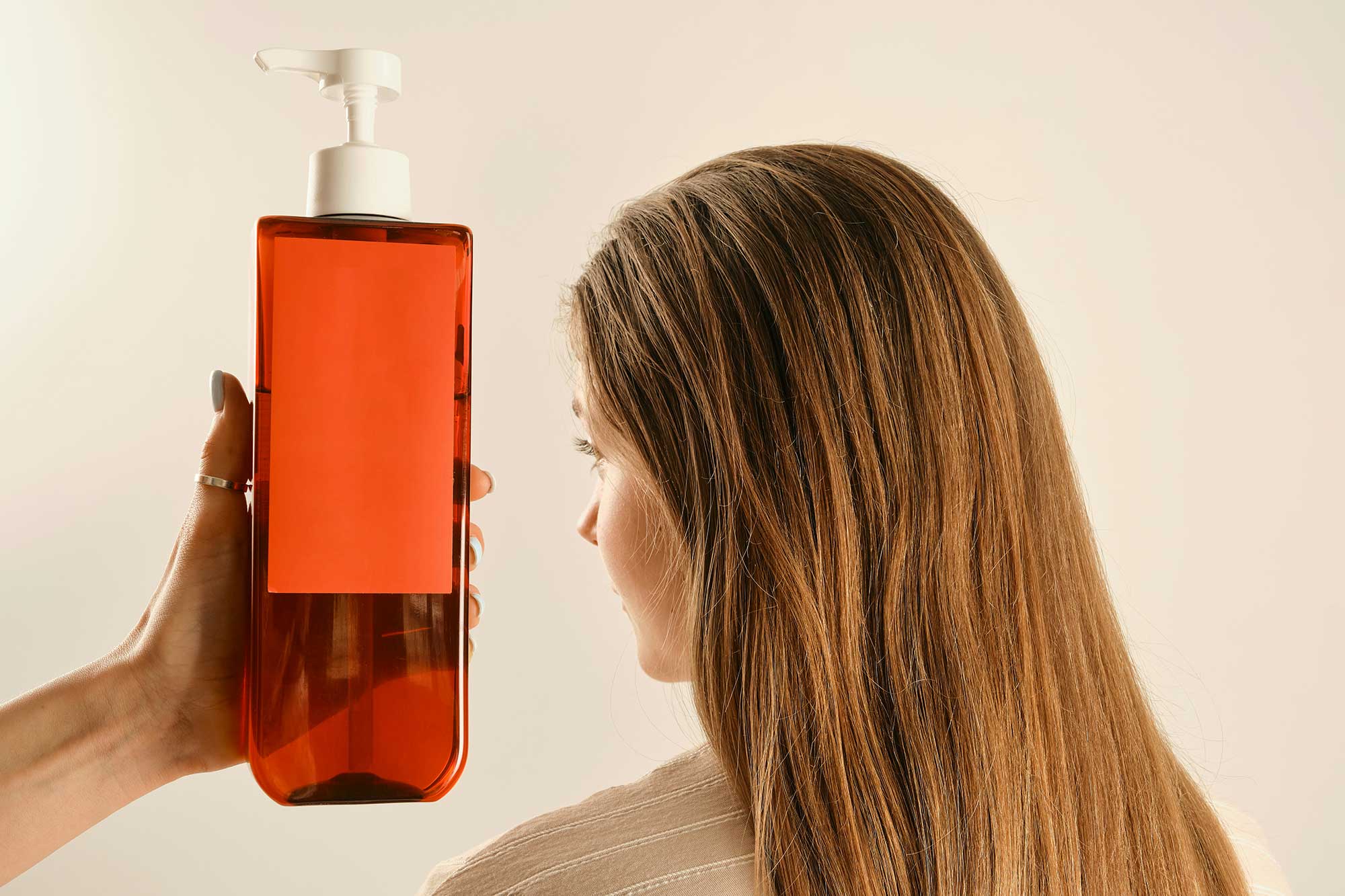 Consumer-focused haircare visual highlighting sensorial product experience, efficacy-driven formulation and premium haircare consumer trends shaping modern product development at THG LABS.